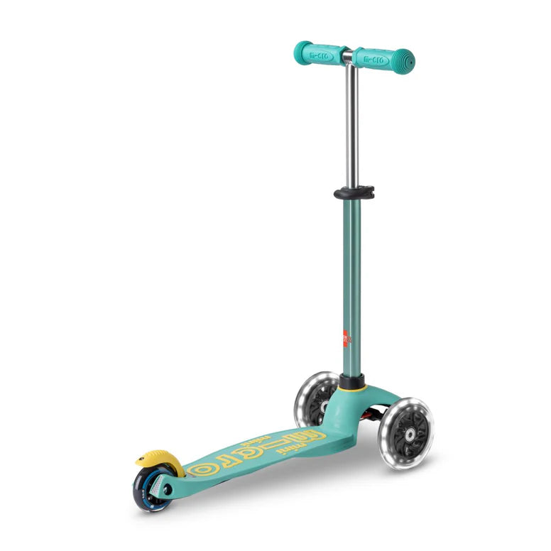 Micro Mini Deluxe Eco Scooter Green three-wheel kids scooter by MICRO with teal deck and grips