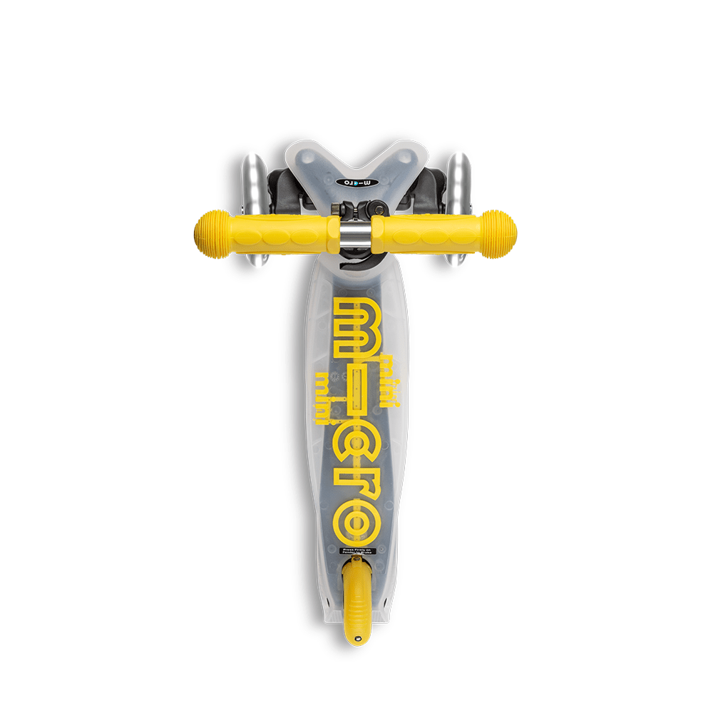 Micro Mini Deluxe Flux LED scooter for kids with yellow handlebars and deck graphics