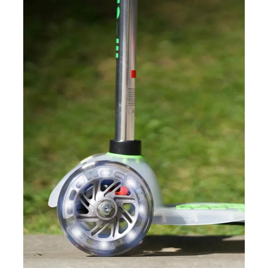 Micro Mini Deluxe Flux LED Scooter with chrome wheel and green accents