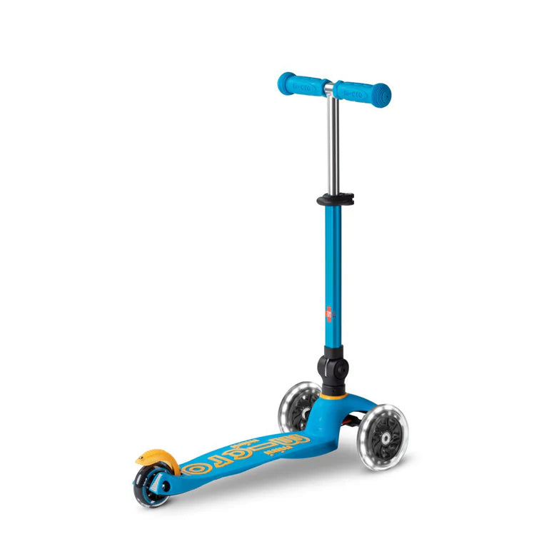 Micro Mini Deluxe Foldable LED Scooter blue 3-wheel kids scooter with adjustable T-bar and LED wheels.