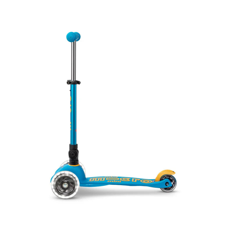 Micro Mini Deluxe Foldable LED Scooter, blue with yellow accents; tall handlebar and light-up front wheel shown.
