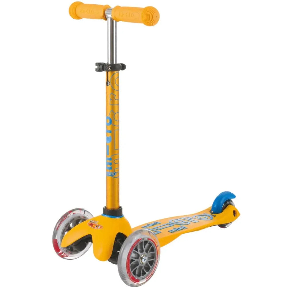 Micro Mini Deluxe Scooter for kids, orange deck and handlebar, blue wheels and MICRO branding.