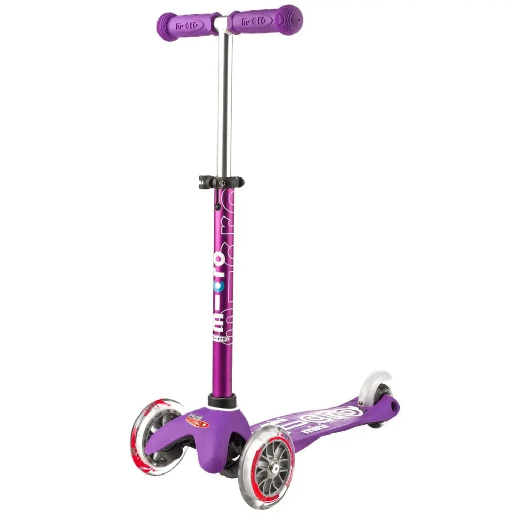 Micro Mini Deluxe Scooter, purple three-wheel design with a silver adjustable handlebar and MICRO branding.