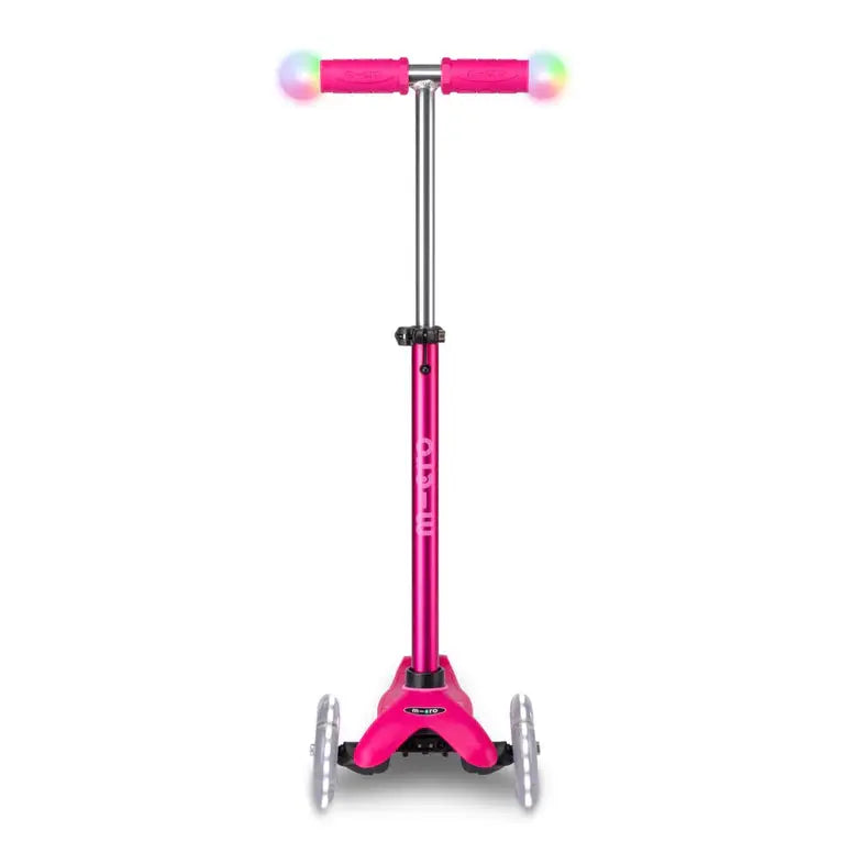 Micro Mini2Grow Deluxe LED scooter in pink, three-wheeled kid's scooter with light-up handlebars and adjustable stem.