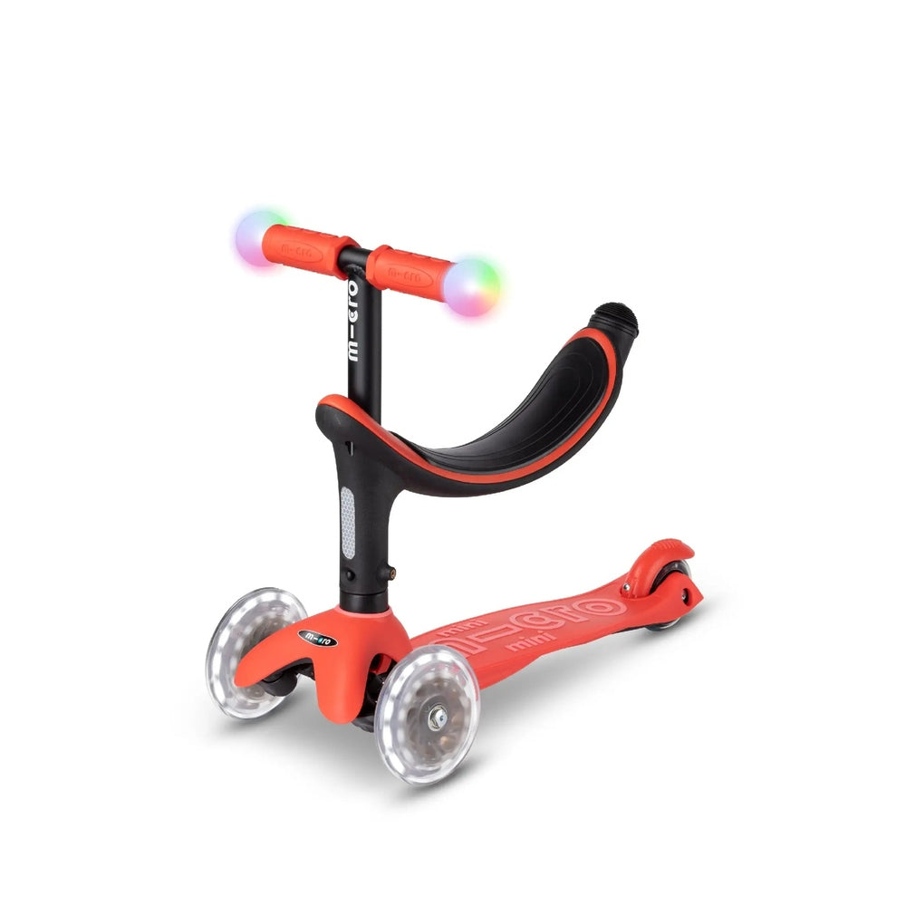 Micro Mini2Grow Deluxe LED Scooter, red with light-up wheels and black ergonomic stem.