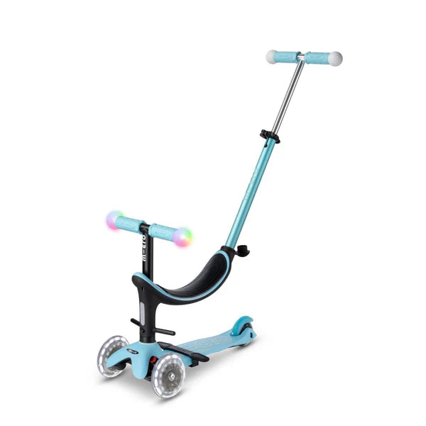 MICRO Mini2Grow Deluxe LED Scooter in blue with LED-lit handlebars and adjustable stem, shown ready to ride.