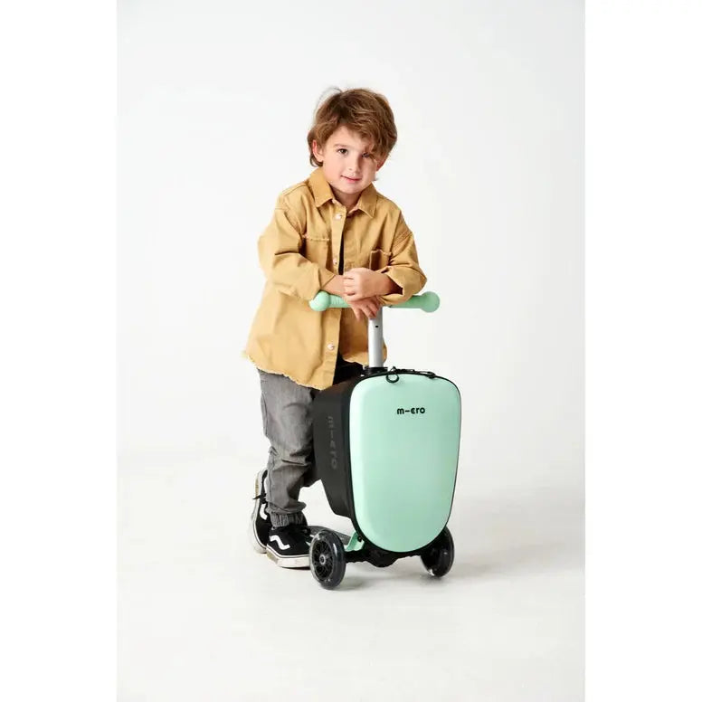 Micro Scooter Junior Luggage Mint kid's suitcase on wheels; mint shell, child pulls its extendable trolley handle.