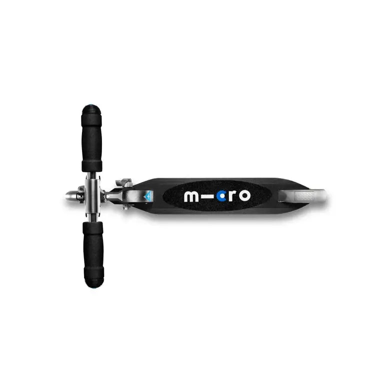 Micro Sprite LED Scooter in black deck with rubber grips and silver neck, MICRO logo visible on deck.