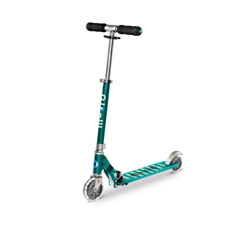 Micro Sprite LED Scooter in teal with silver accents, standing on its two wheels against white background.