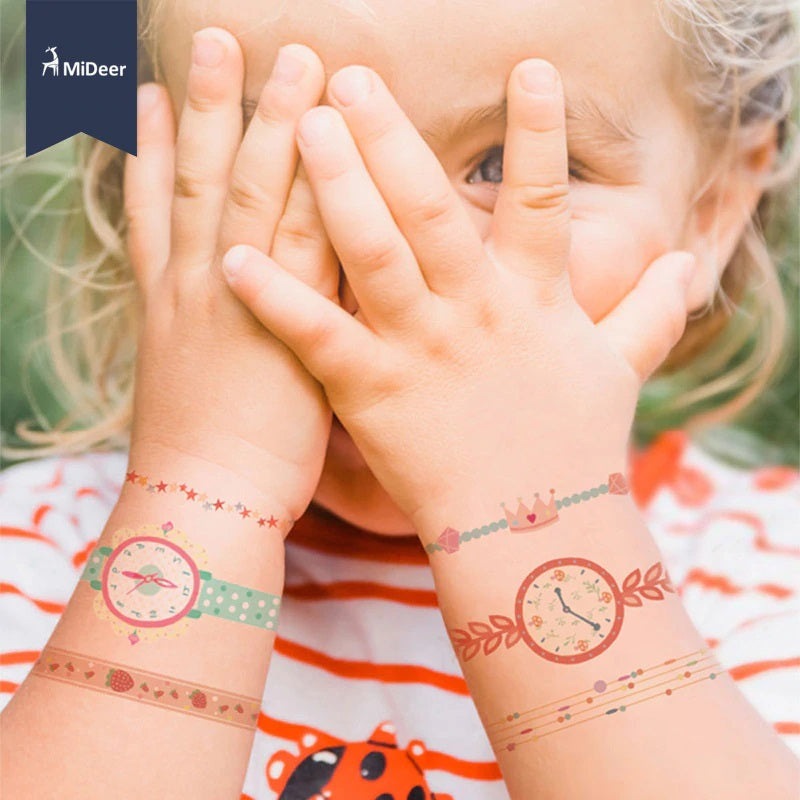 Mideer temporary tattoo watch and bracelet set on two wrists; pastel pink and green designs