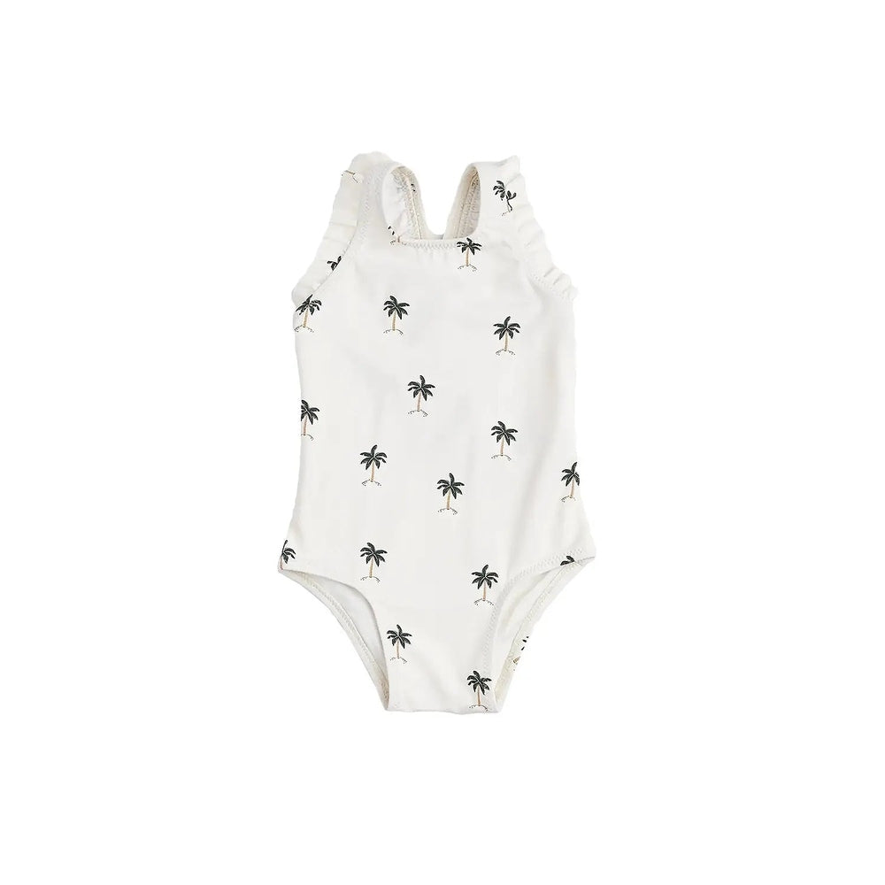 Miles The Label Palm Trees ruffled one-piece swimsuit in white with black palm print, featuring textured shoulder ruffles.
