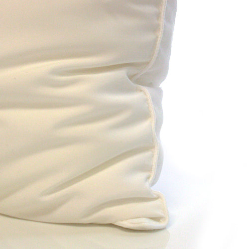 Milo & Gabby Kids Pillow Insert in cream fabric with visible seam edge.