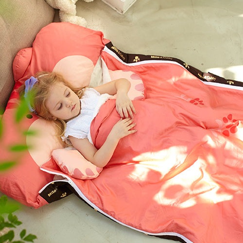 Milo & Gabby kids sleeping bag in pink coral with white trim and branding.