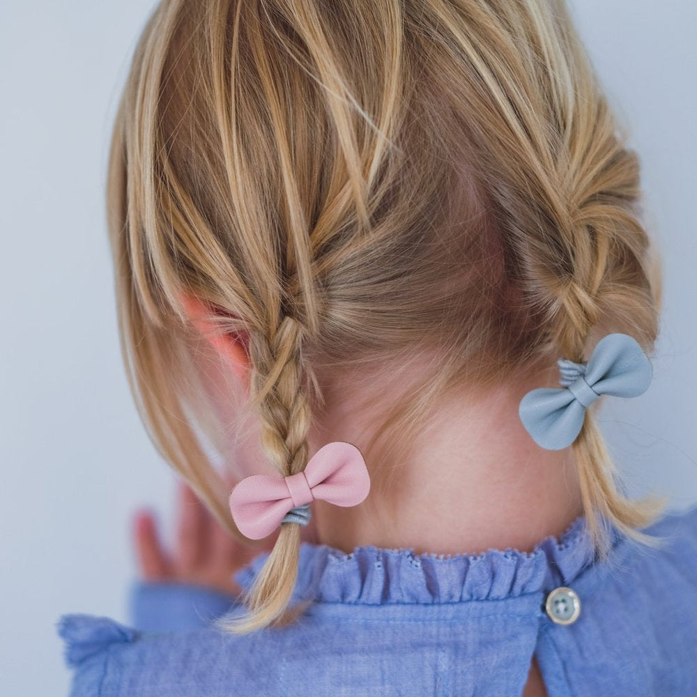 Mimi & Lula Gracie Ponies Pink hair bows on braided pigtails with pastel accents