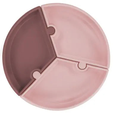 MINIKOIOI Puzzle Plate pink and brown three-section feeding plate shown with interlocking segments.