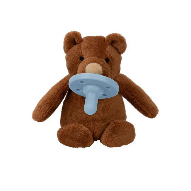 Minikoioi Sleep Buddy plush bear sits upright with a blue pacifier attached to its mouth.