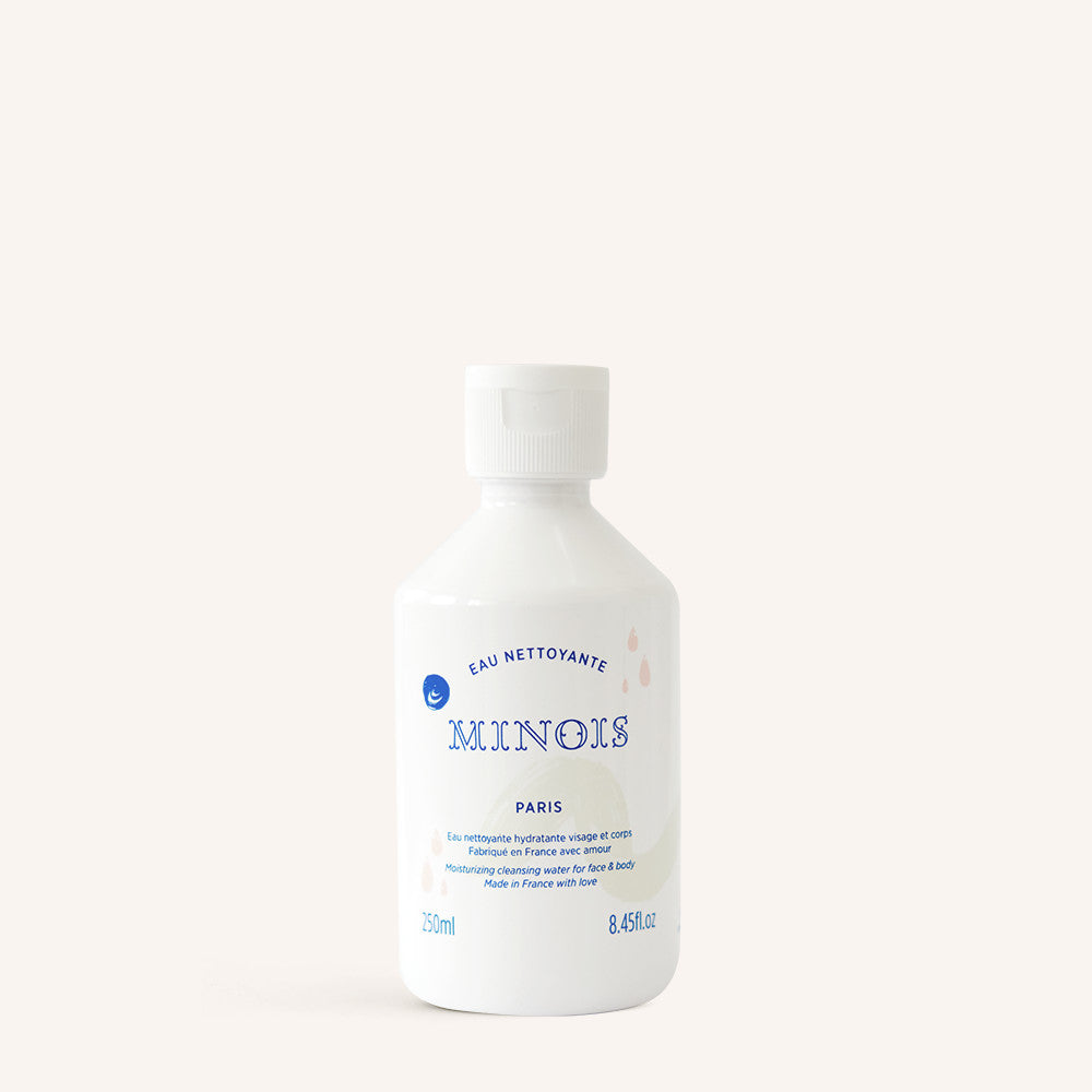 Minois Paris Cleansing Water 250 ml bottle, white plastic with blue branding.