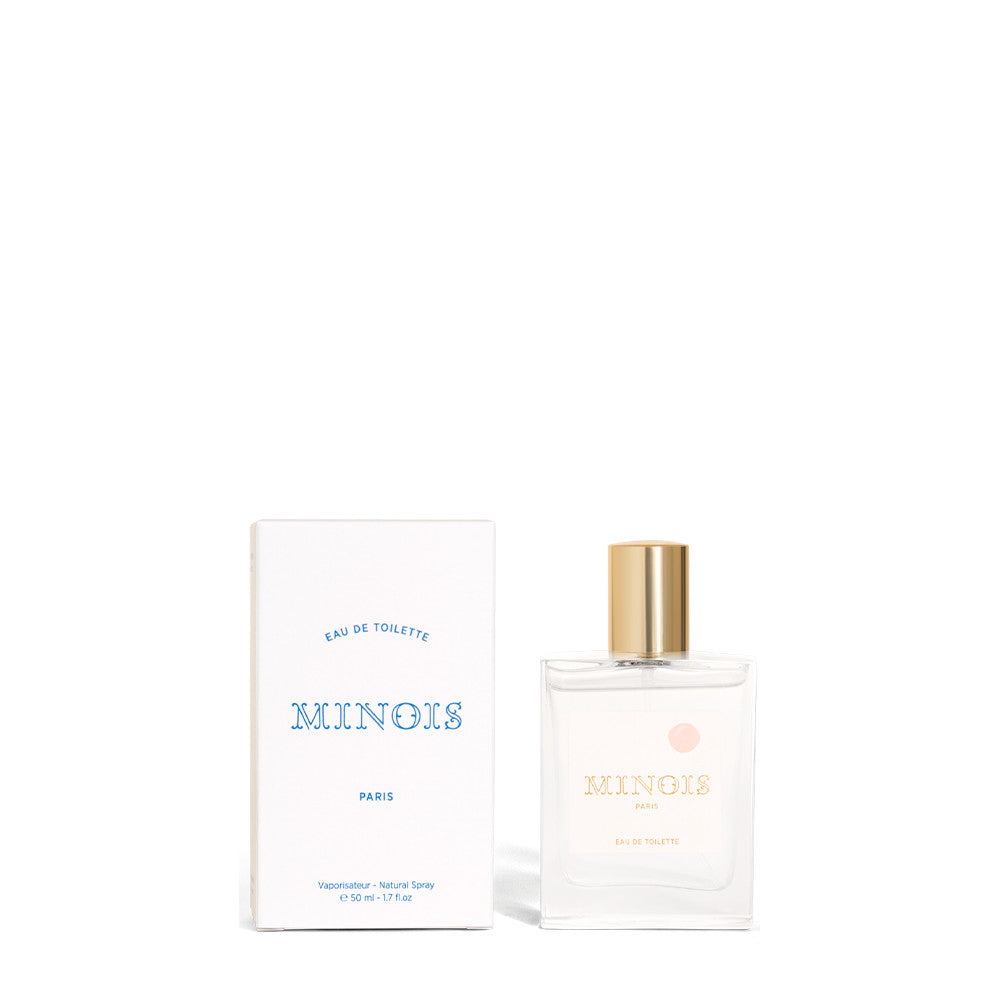Minois Paris perfume 50 ml for kids and mum; clear glass bottle with gold cap beside white box