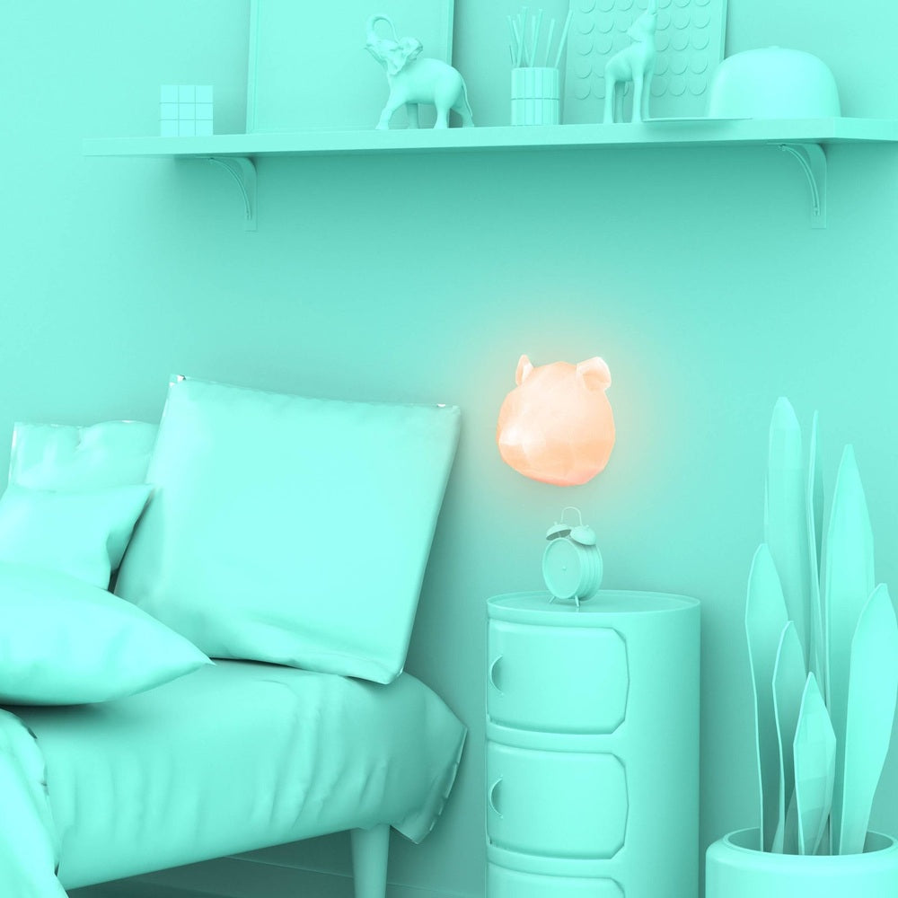 Mob Wall Night Light-Panda; wall-mounted panda lamp with peach glow in teal bedroom