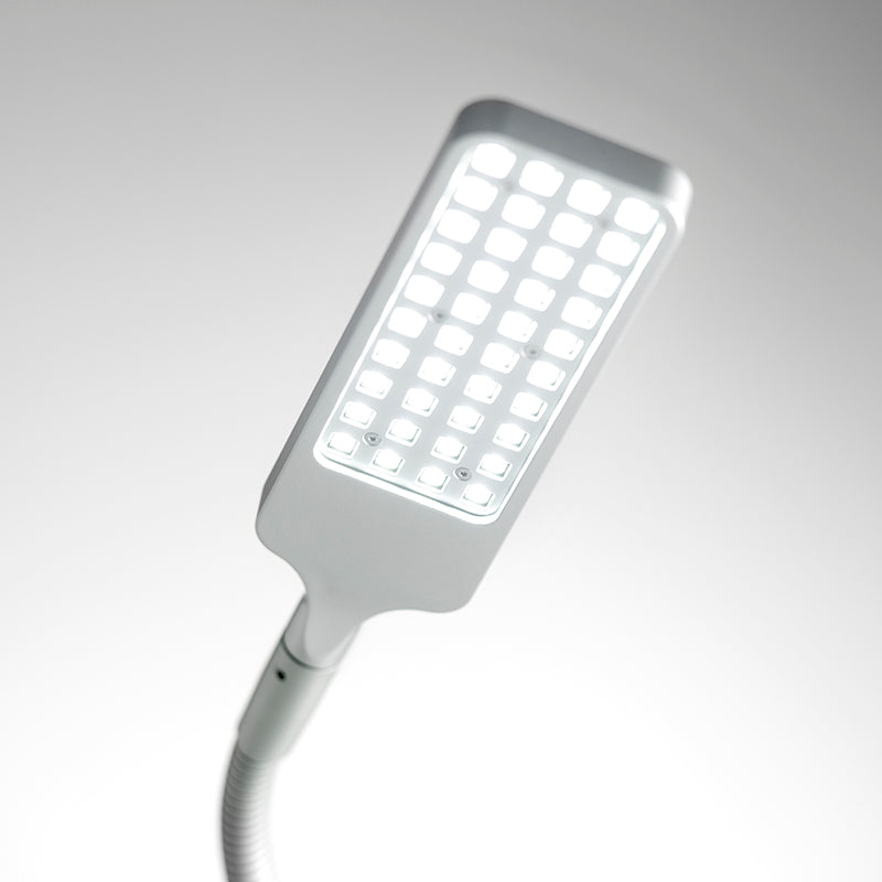MOLL FlexLight desk lamp in white with a flexible neck and grid LED panel for study