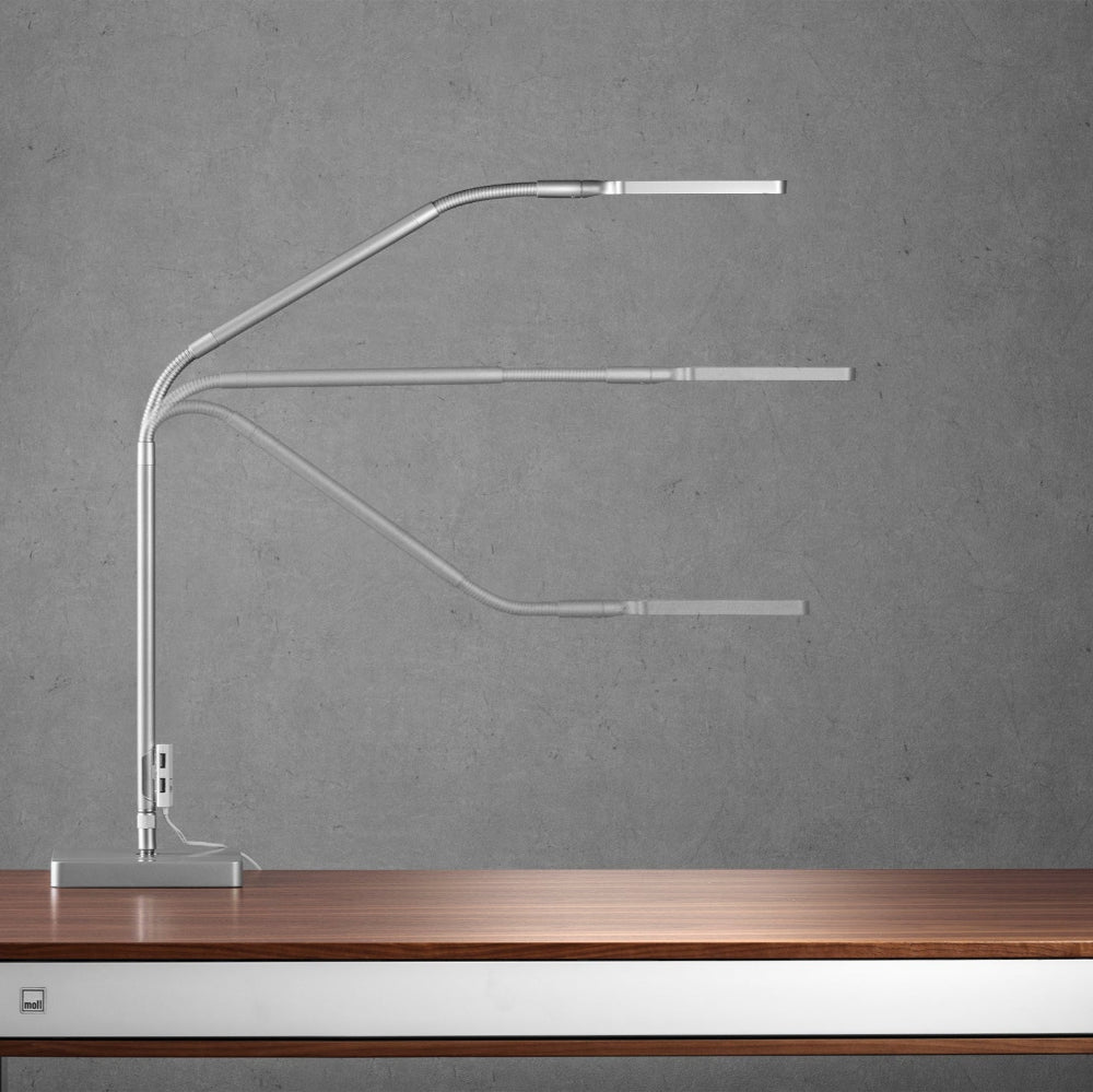 MOLL L7 designer LED desk lamp, silver metal with three adjustable arms by MOLL.