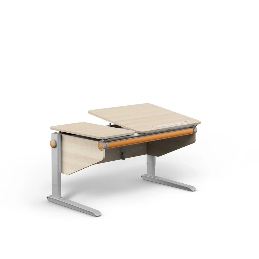 Moll Winner Classic Desk in light wood with gray metal frame, showing the adjustable-height surface in use.