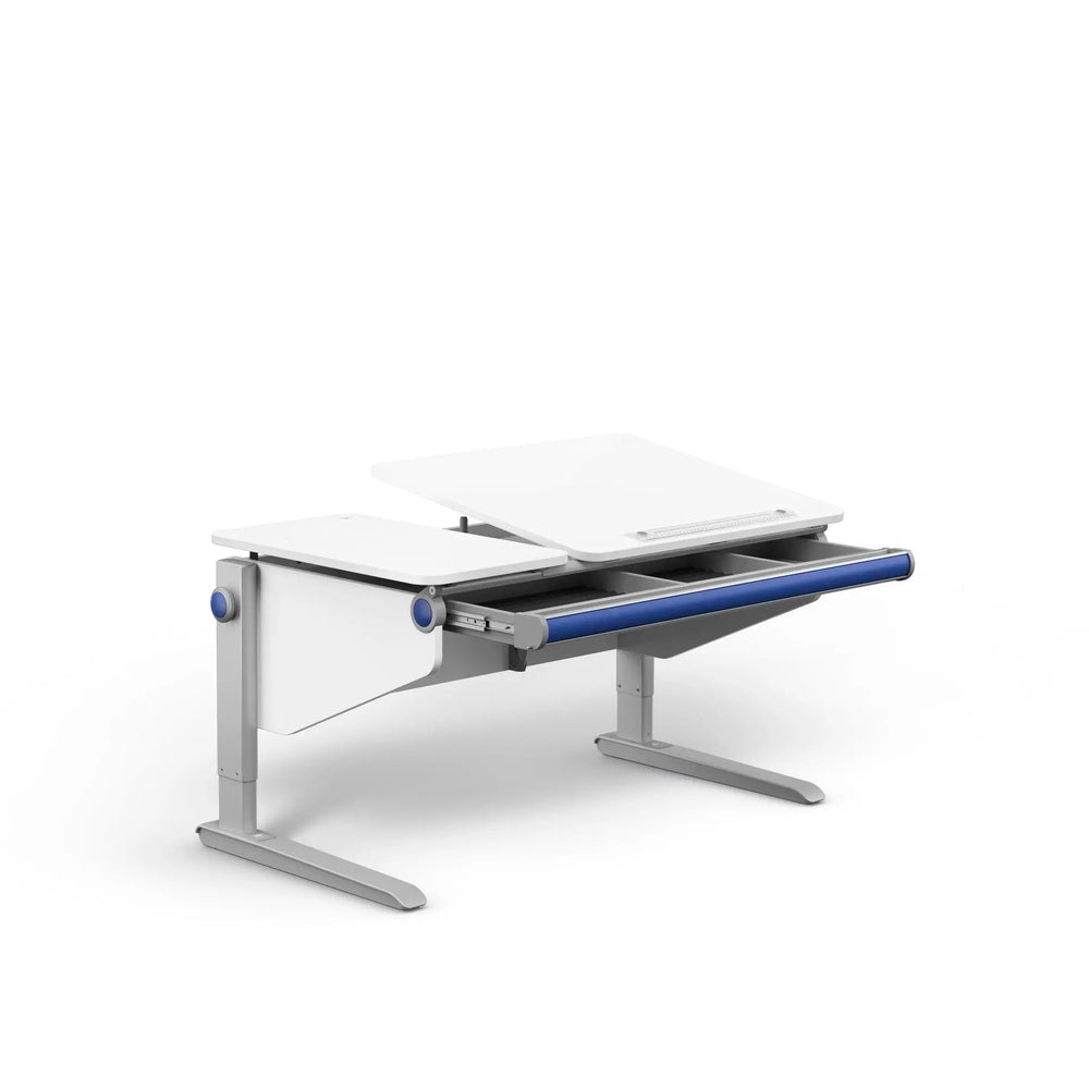 Moll Winner Comfort Desk in white with blue edge, tilting top raised for ergonomic use.
