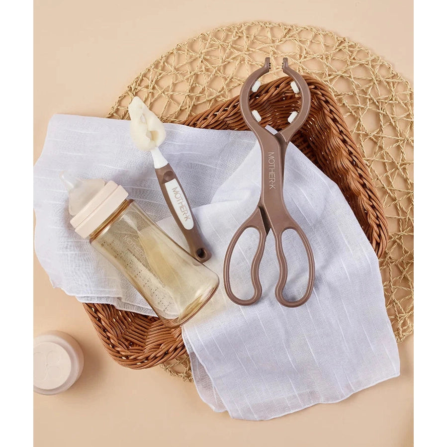 Mother-K Holic 3.6.9 feeding bottle gift set including baby bottle, nipple brush, and tongs (3-piece)