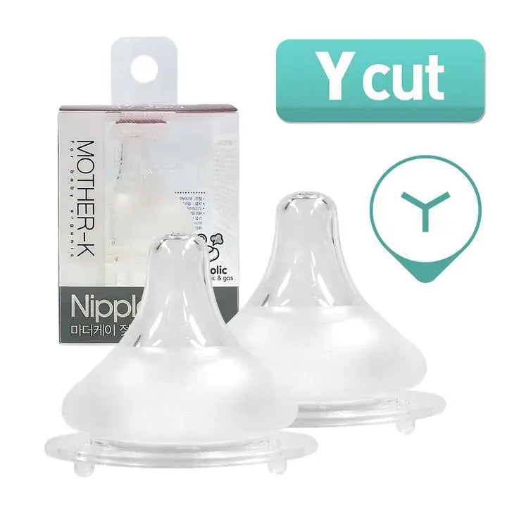 Mother-K Nipple For Feeding Bottle 2P, translucent silicone Y-cut nipples shown beside their box for easy feeding.