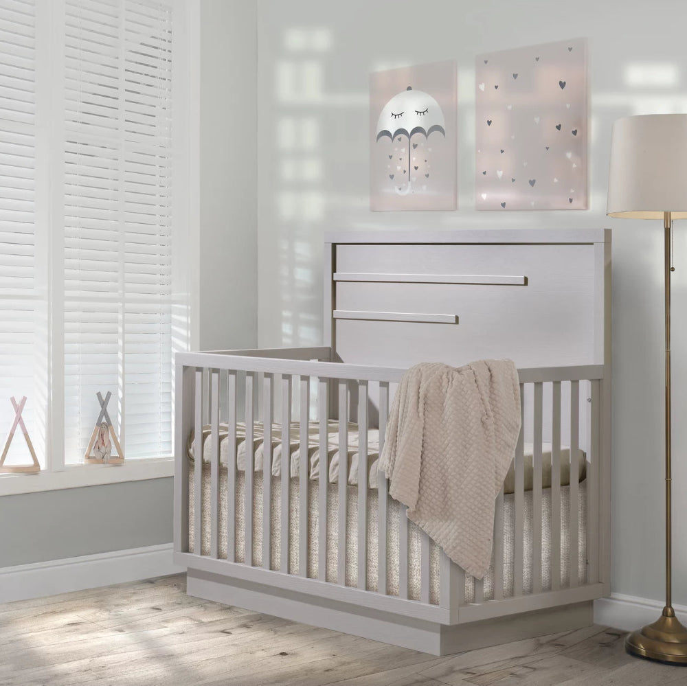 Natart Como 4-in-1 convertible crib in gray with horizontal molding in a modern nursery by NATART
