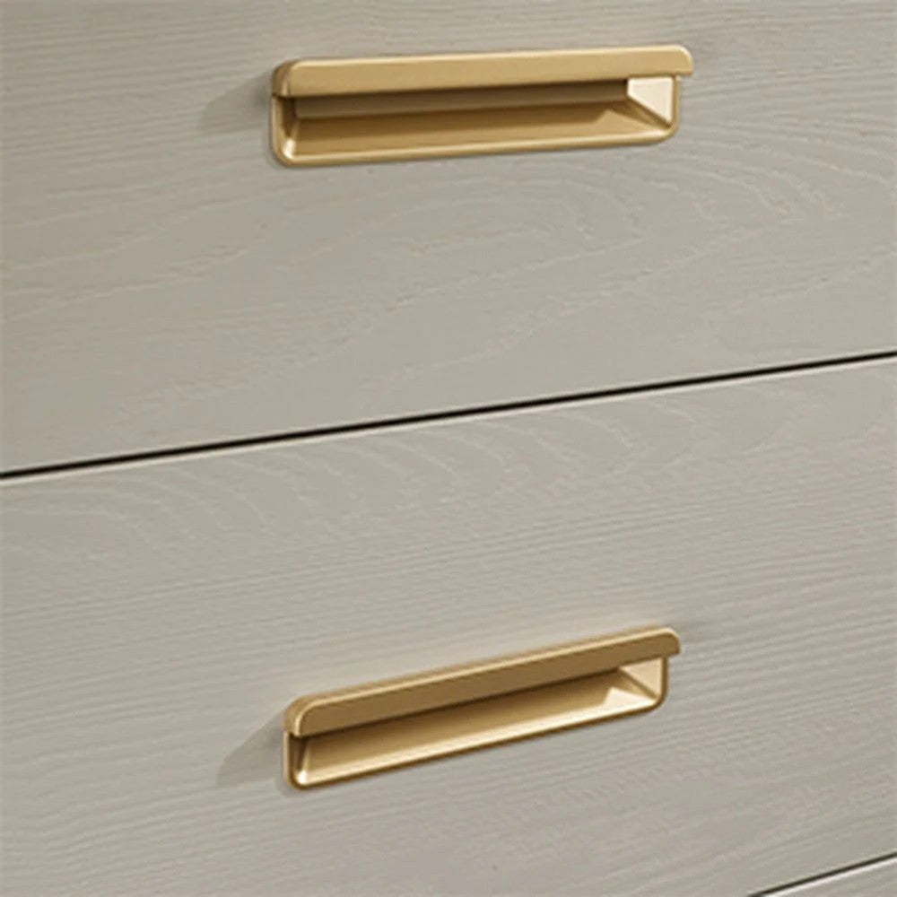 Natart Signature Series Palo 6-Drawer King Dresser in light wood with gold bar handles and aligned fronts.
