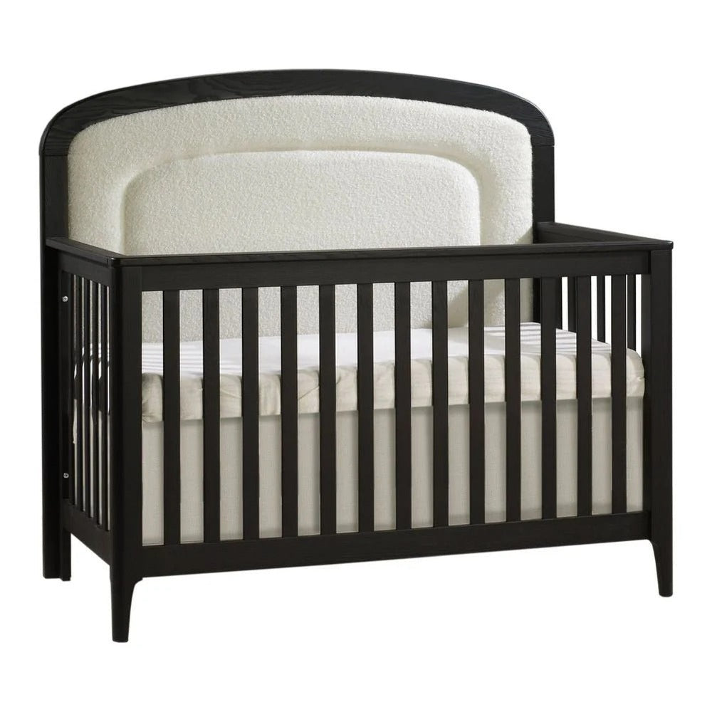 Natart Palo 5-in-1 convertible crib in black with upholstered panel headboard