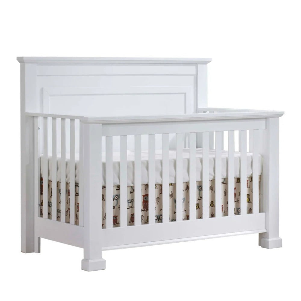 Natart Taylor white 5-in-1 convertible crib with slatted sides and tall headboard