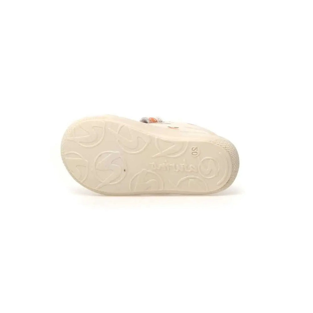 Naturino Cocoon Vl White Peach baby shoe-cream sole with embossed tread pattern visible.