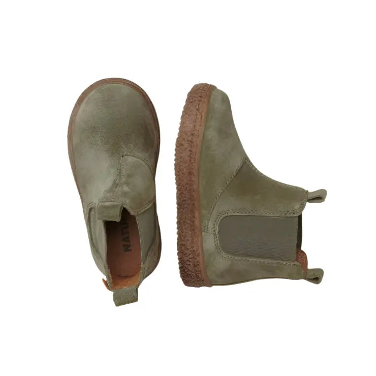Pair of Naturino Figus Suede Militare baby boots, olive green with brown crepe sole and elastic side panel.