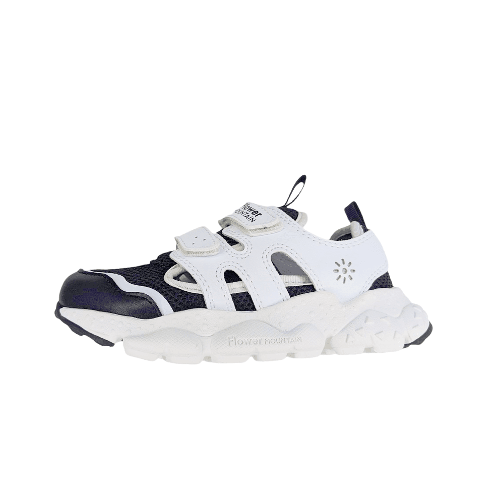 Naturino Goro Junior Black-White toddler sneaker with black mesh, white overlays, and chunky sole NATURINO