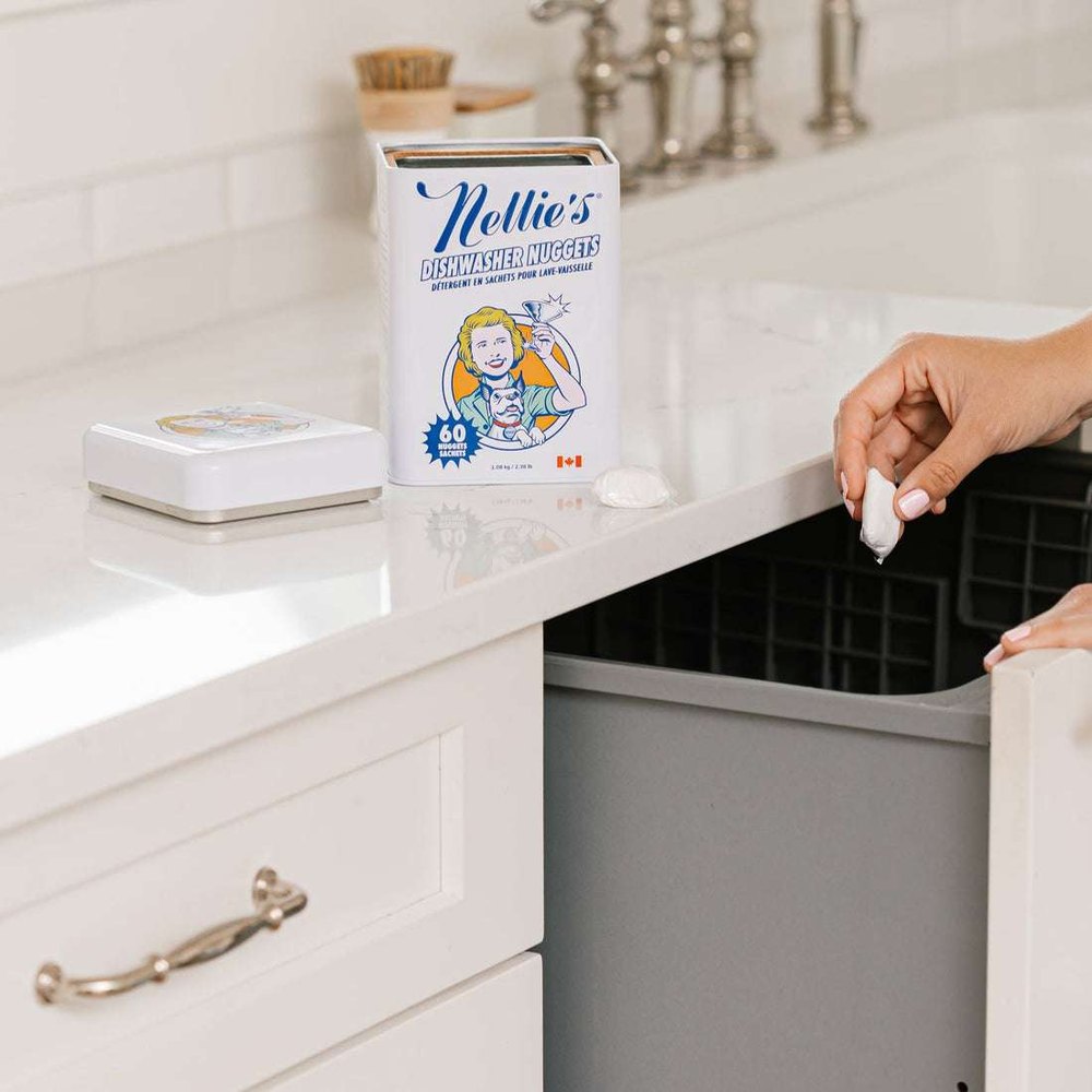 Nellie's Dishwasher Nuggets 60-count box with blue logo on white kitchen counter