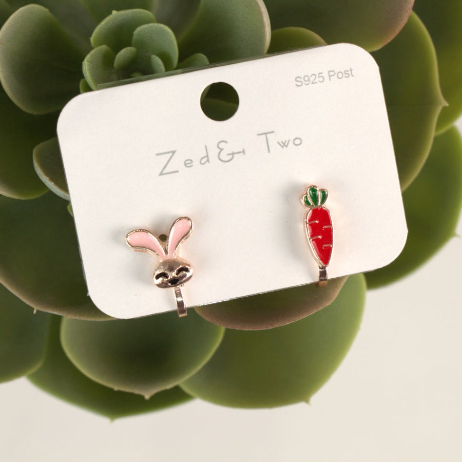 Nemibaby earrings: pink bunny ears and red carrot enamel charms on gold-tone posts, 2 earrings