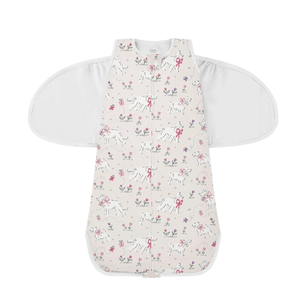NEST DESIGNS Nest Designs 1.0 TOG Swaddle Sleep Bag Doggie Meadow zipper front closure with extended white swaddle wings img 4/6