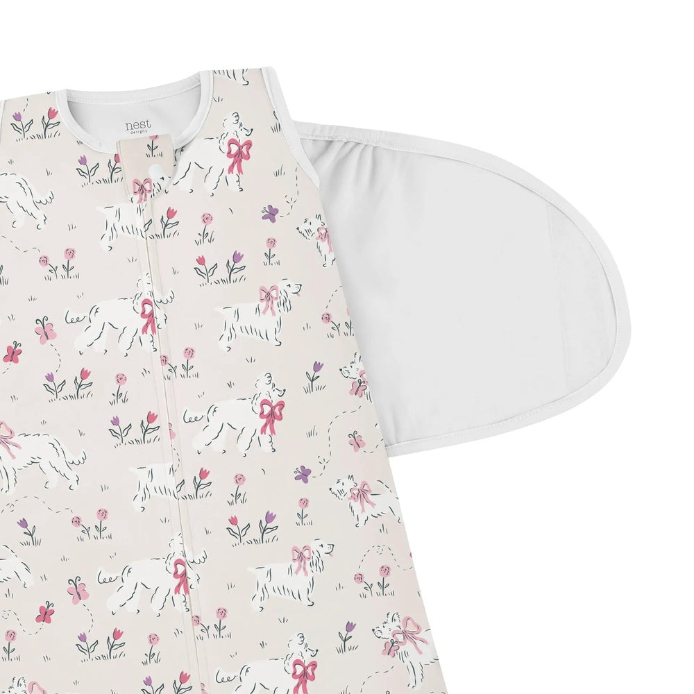 NEST DESIGNS Nest Designs 1.0 TOG Swaddle Sleep Bag Doggie Meadow with extended shoulder wings and front zipper closure img 5/6