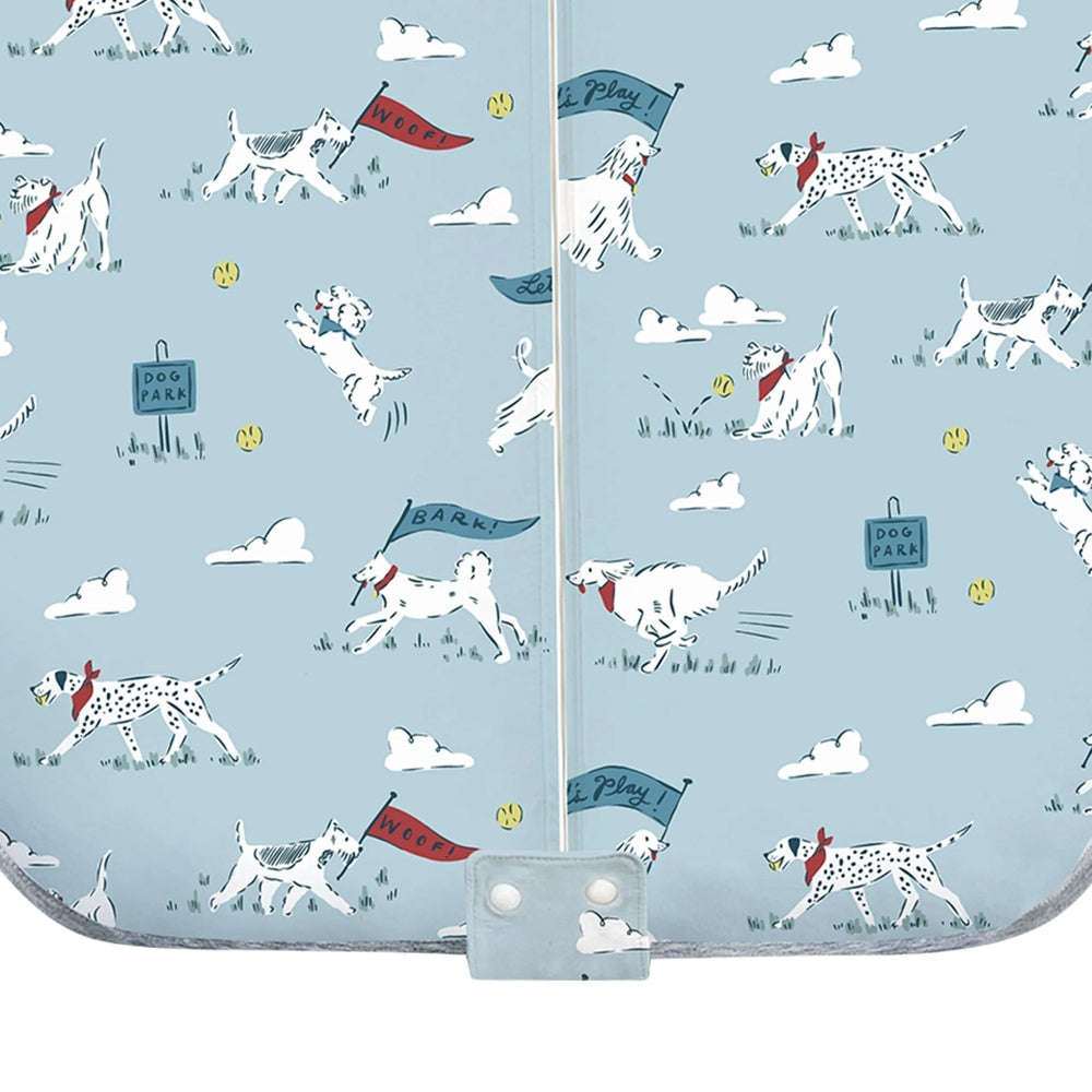 NEST DESIGNS Nest Designs 1.0 TOG Swaddle Sleep Bag Puppy Park snap closure at bottom with grey piping trim img 5/6