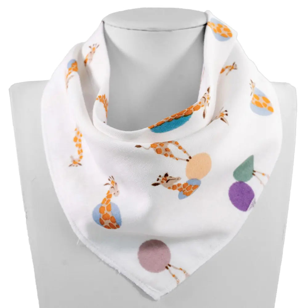 Nest Designs bamboo baby bandana bib, white with orange giraffe print, one size 3M-24M.