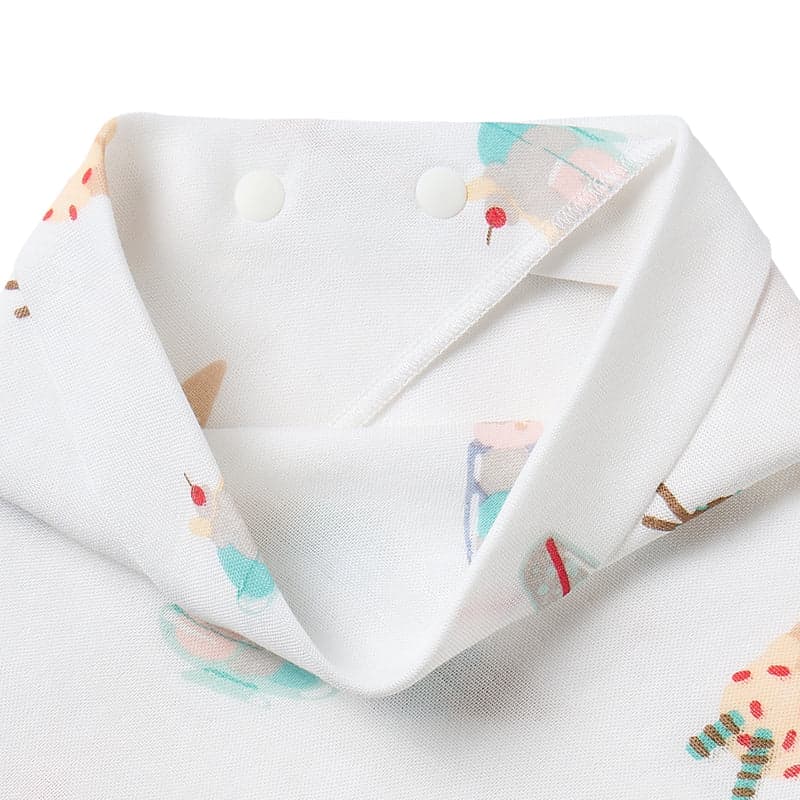 Nest Designs Bamboo Baby Bandana Bib One Size 3M-24M, white with colorful prints, snap closures at neckline.