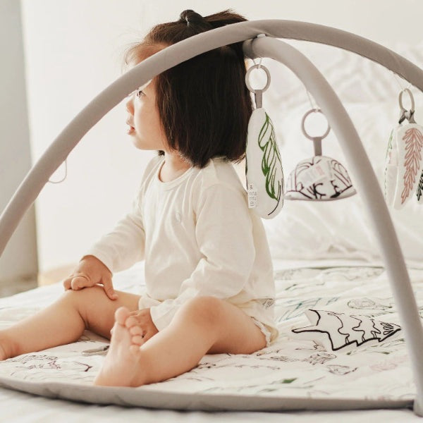 Nest Designs bamboo baby play mat and activity gym with hanging leaf toys, Fresh Forest