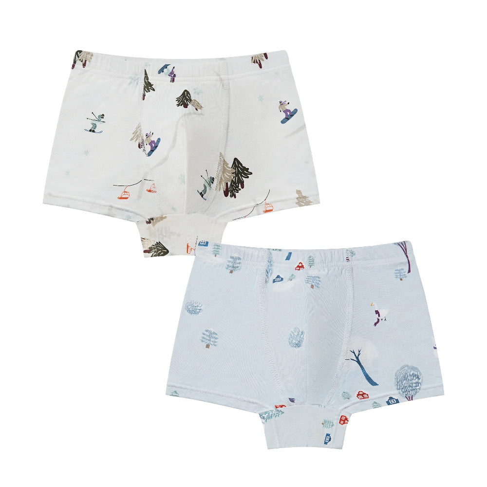 Nest Designs Bamboo Boys Boxer Briefs Underwear (2 Pack) Winter Fun; two flat white and pale blue trunks with winter trees and skiers.