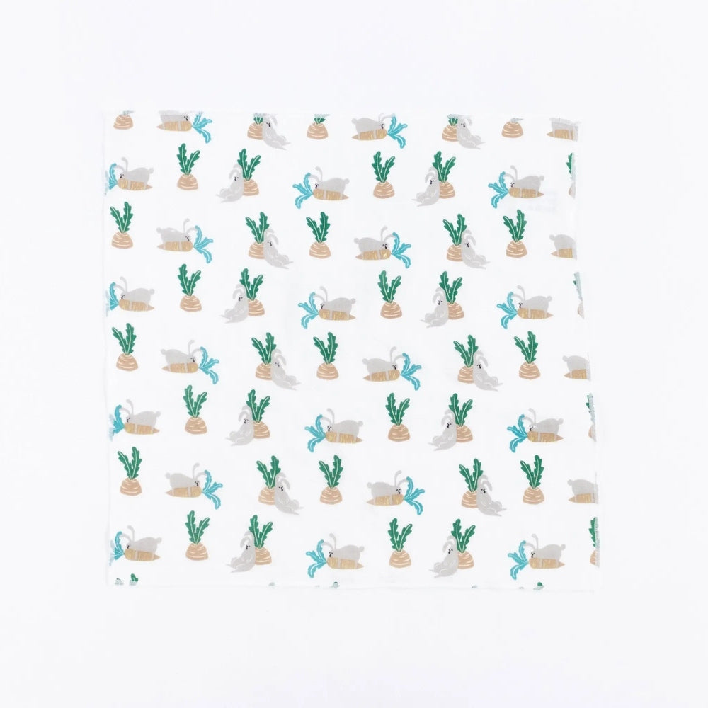 Nest Designs Bamboo Bubs baby washcloth set, white six-pack, with green plants and beige rabbits, laid flat.