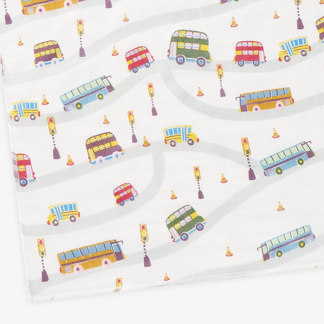 Close-up of light blue Buses And Boats washcloth with canoes, kayaks and ripple motifs.