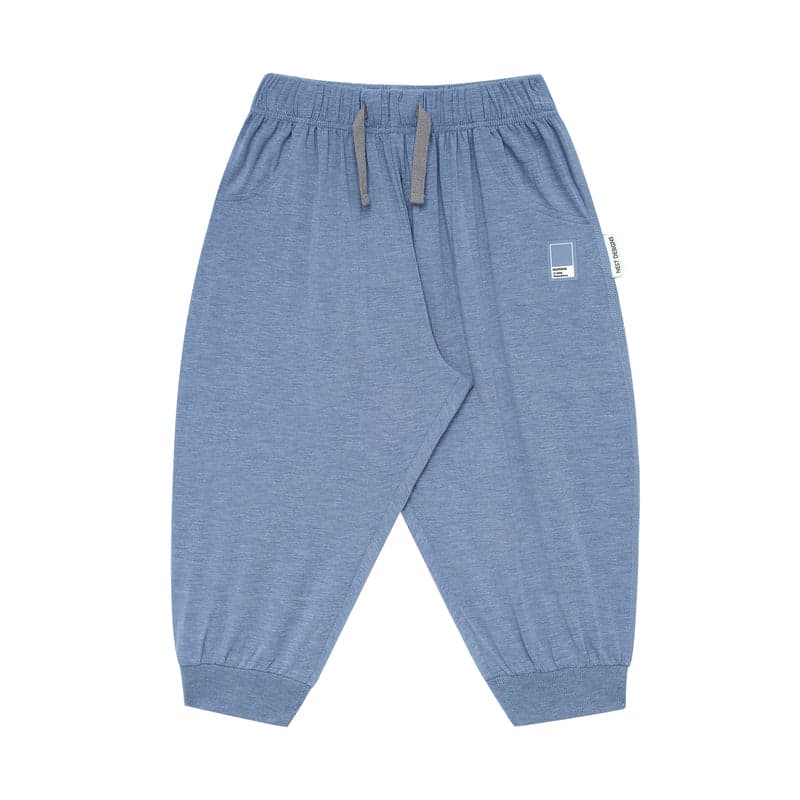 Nest Designs Bamboo Jersey Harem Pants Troposphere in blue, flat-lay with drawstring waist and ribbed cuffs.