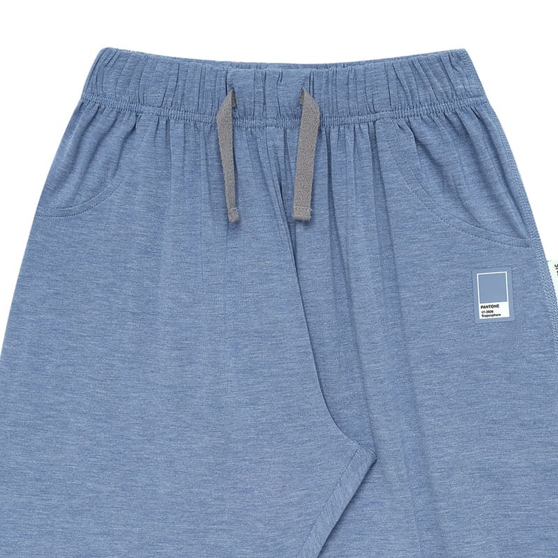 Nest Designs Bamboo Jersey Harem Pants Troposphere in blue, featuring a drawstring waist and side pockets.