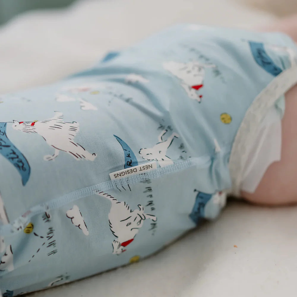 Puppy Park onesie side seam and fabric label detail